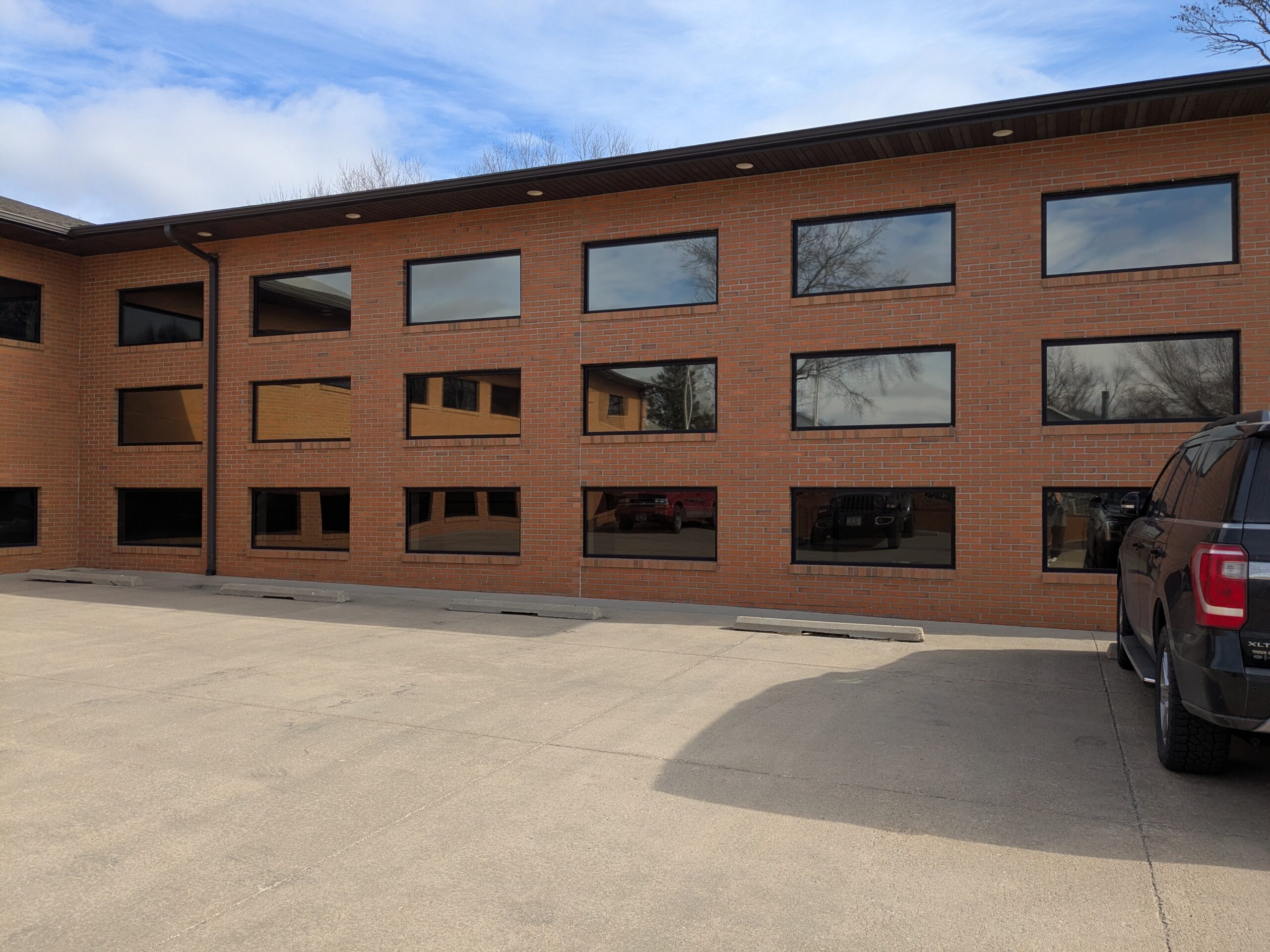 Office building with mirrored window film in Lawton, Iowa