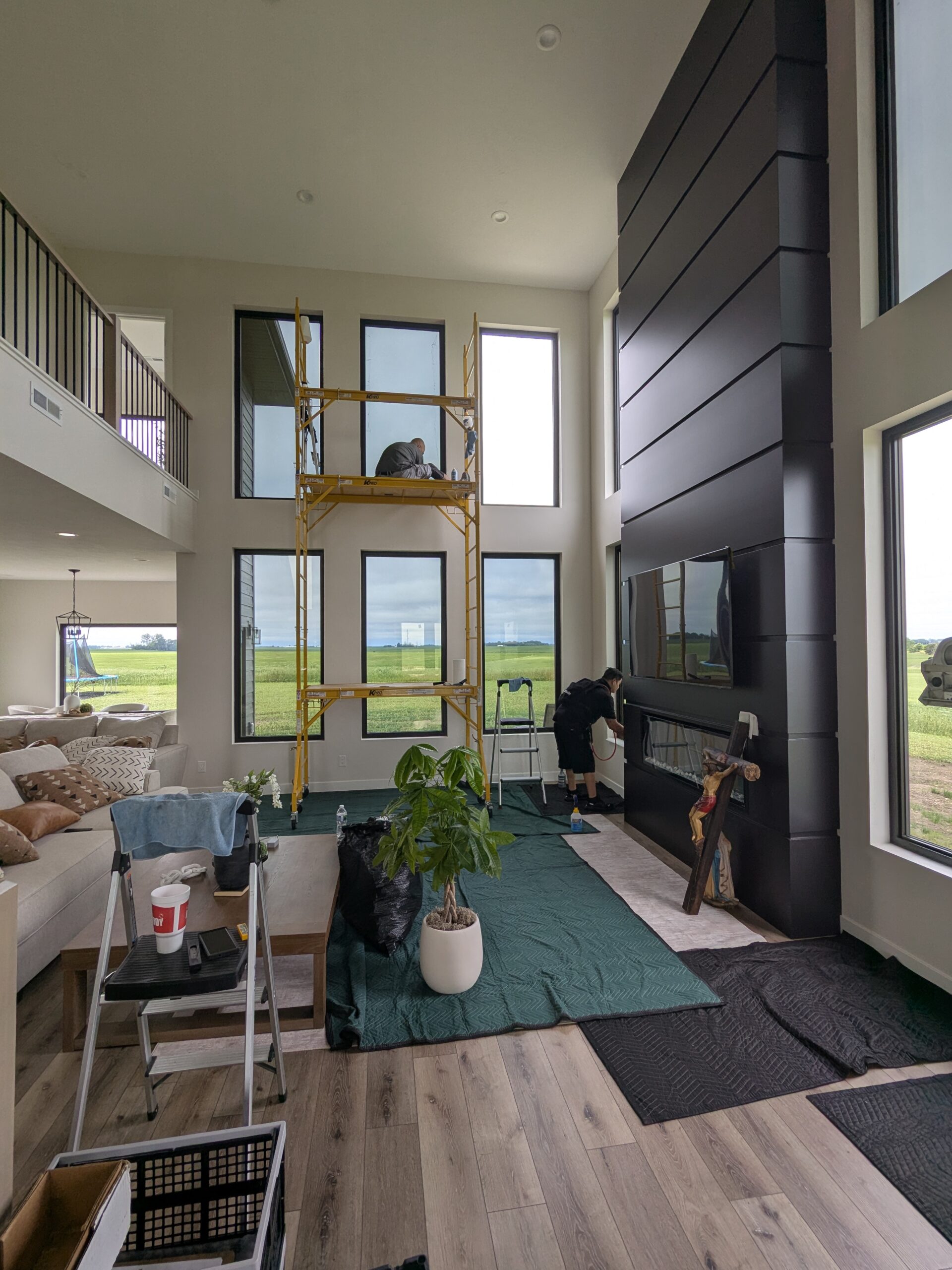 Exterior of a modern two-story home with tall windows in Kingsley, Iowa