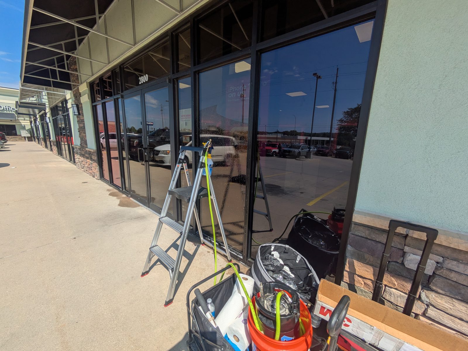 Storefront glass set up for a commercial window film install
